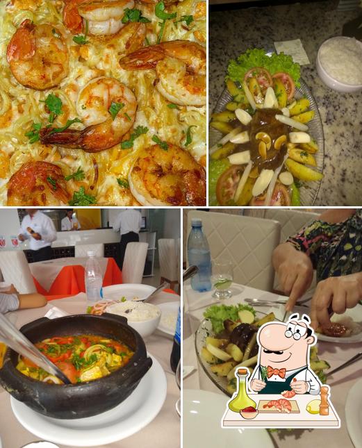 Camarão e grãos em Gomes Restaurante