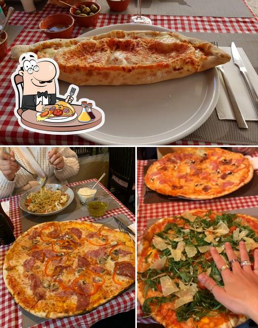 Отведайте пиццу в "La dolce vita Trattoria-Pizzeria"