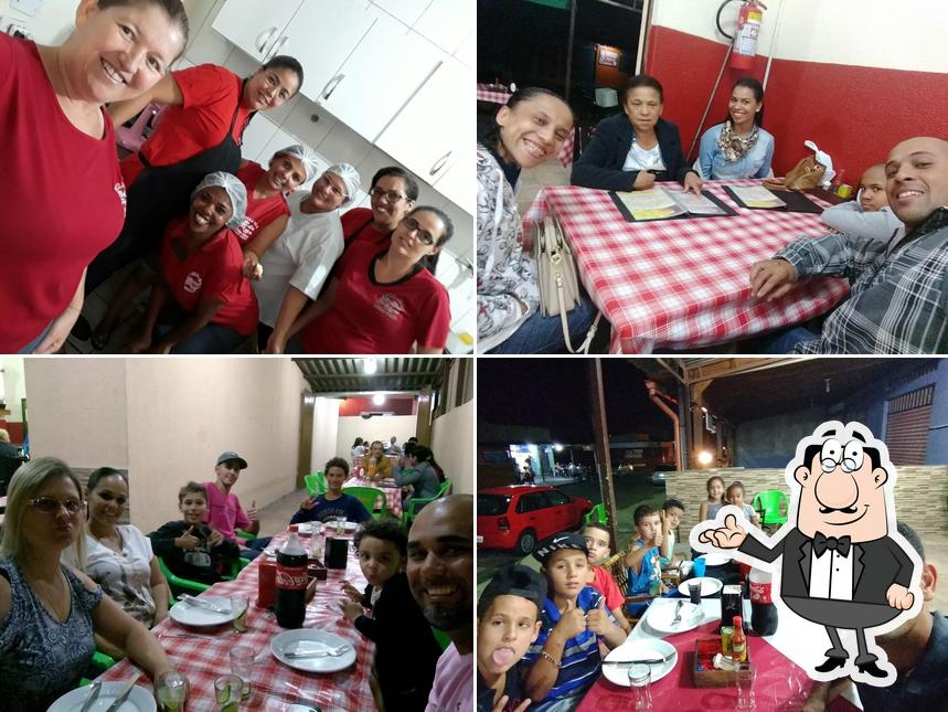 O interior do Pizzaria Bella Pizza