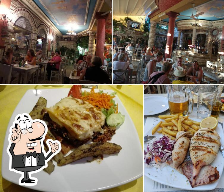 Observa las fotos que muestran interior y comida en Restaurant Vergina
