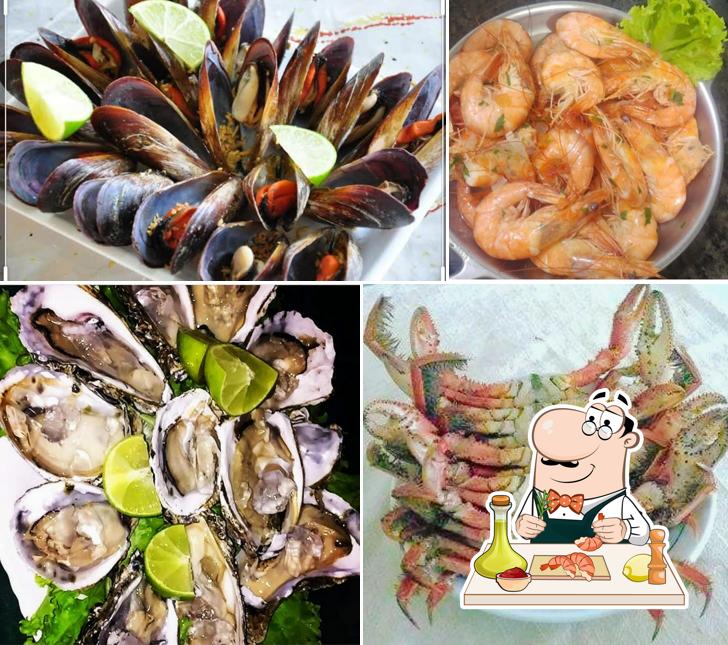 Consiga frutos do mar no Caranguejo Restaurante e Petiscaria