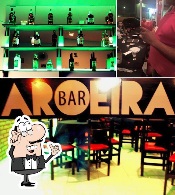 Entre diversos coisas, interior e álcool podem ser encontrados no Aroeira Bar Matão