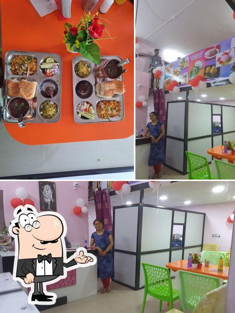 The picture of interior and food at Desi Refreshment