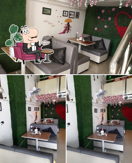 Take a seat at one of the tables at CAFE TOWN