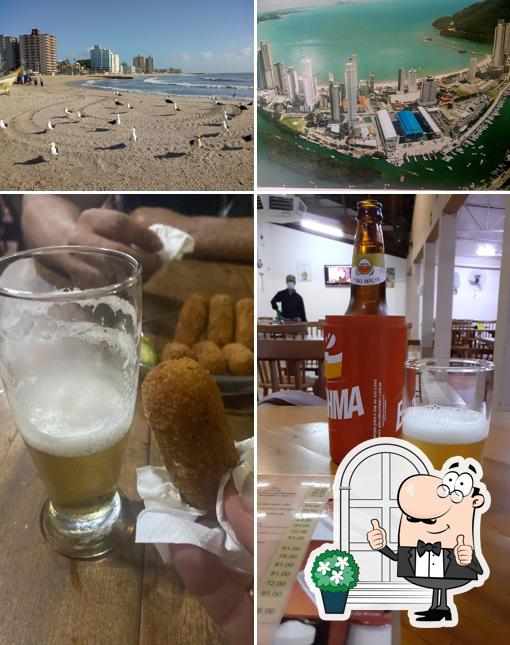 Esta é a ilustração mostrando exterior e bebida a Bar Madalena