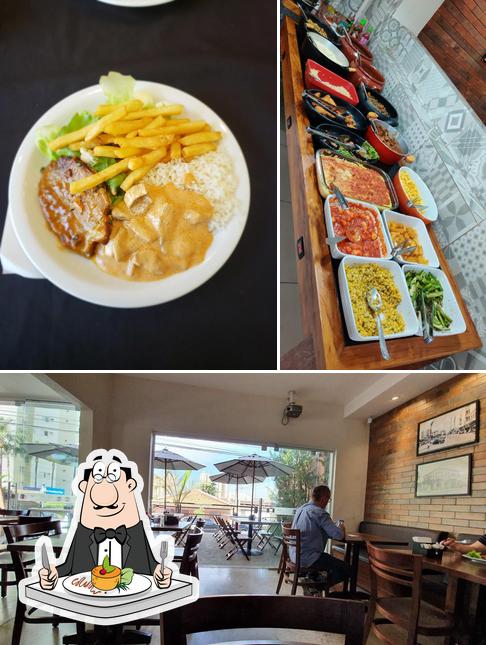 Entre diversos coisas, comida e interior podem ser encontrados a Memphis Bar e Cozinha