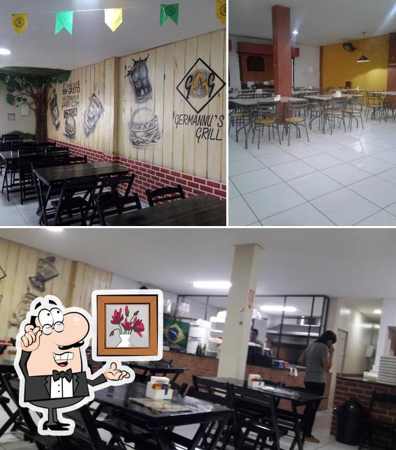 O interior do Germannu's Grill ( pizzaria e hambúrgueria)