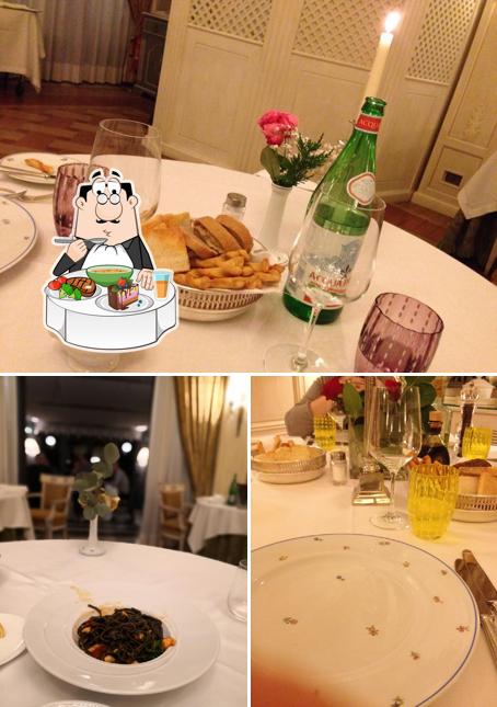 La foto della tavolo da pranzo e cibo di Hotel Villa Franceschi