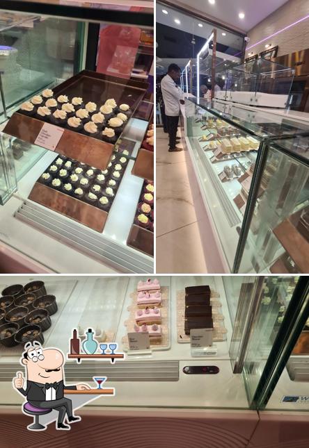 Take a seat at one of the tables at Shree Anandhaas Bakery