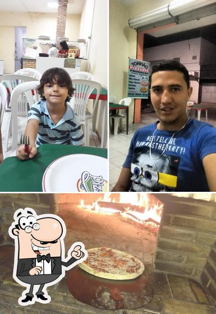 O interior do Tonhão Pizzaria