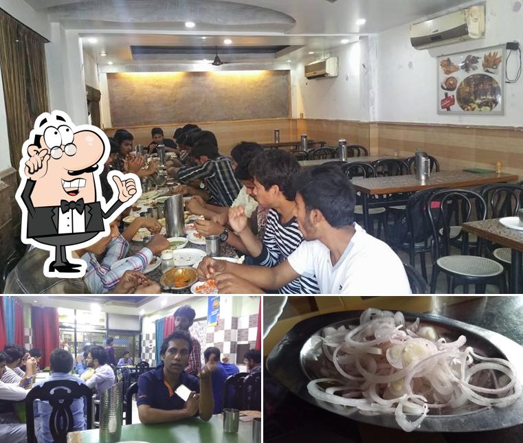 This is the photo displaying interior and food at Golden Restaurant