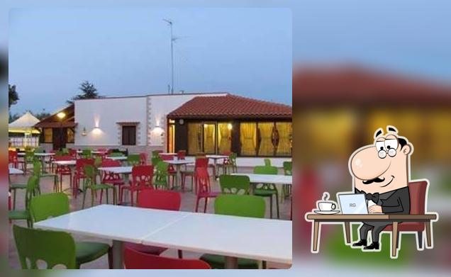 Siediti a un tavolo di Pizzeria Cinque Sensi