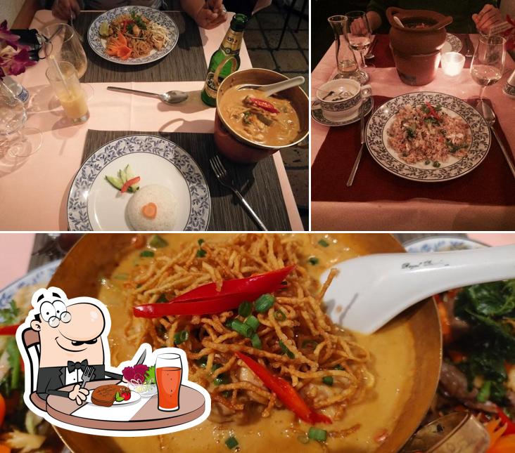 The photo of dining table and food at Ban Song Thai Restaurant
