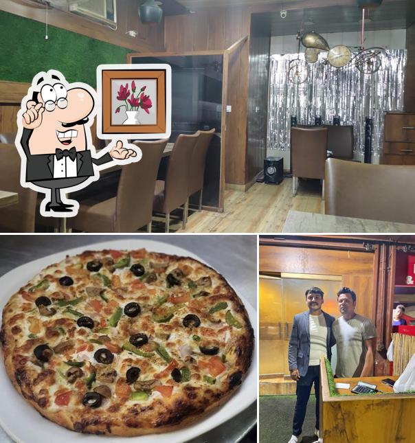 Bawarchi Restaurant is distinguished by interior and pizza