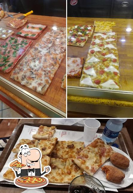 Prova una pizza a Pizzeria Tavola Calda