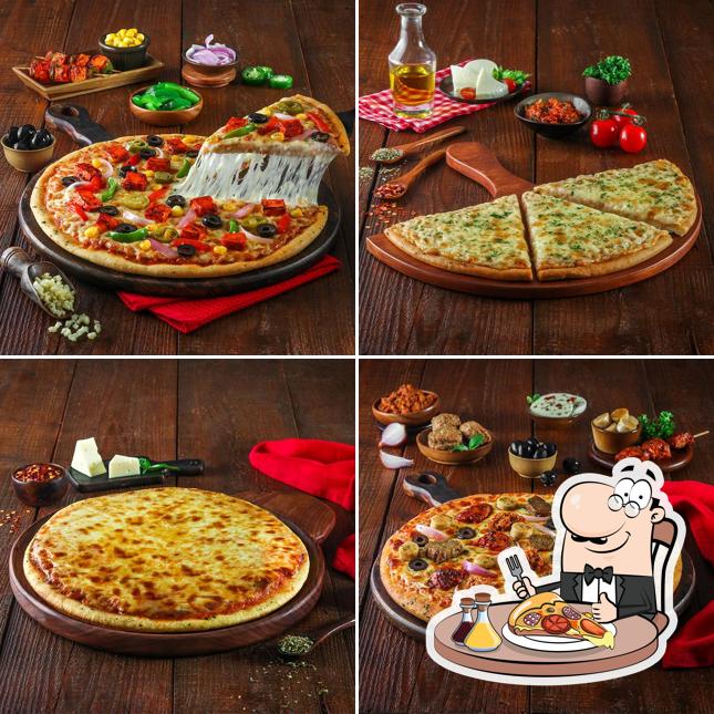 Try out pizza at Oven Story