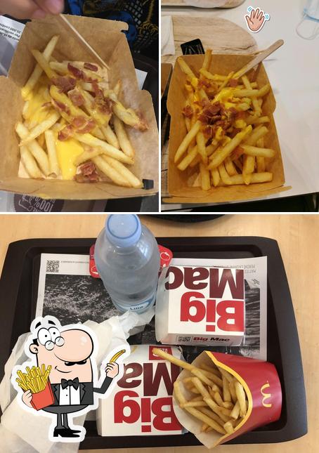 Assaggia le patatine fritte a McDonald's Pisa Stazione