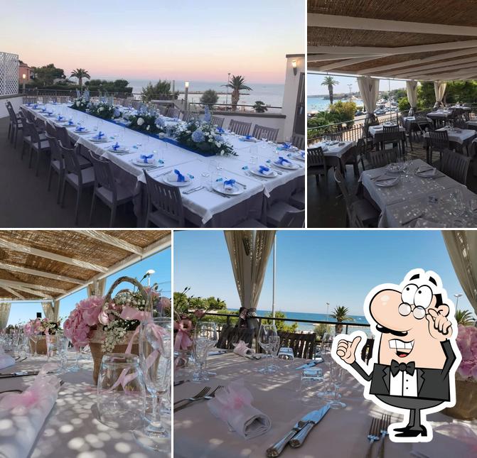 Dai un'occhiata agli interni di Ristorante Pizzeria la Terrazza sul Mare