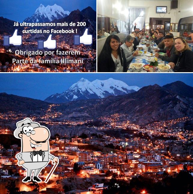 A foto da exterior e mesa de jantar no Restaurante Illimani