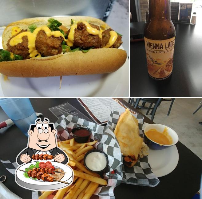 Check out the image showing food and beer at AJ's Sports Grille & Smokehouse