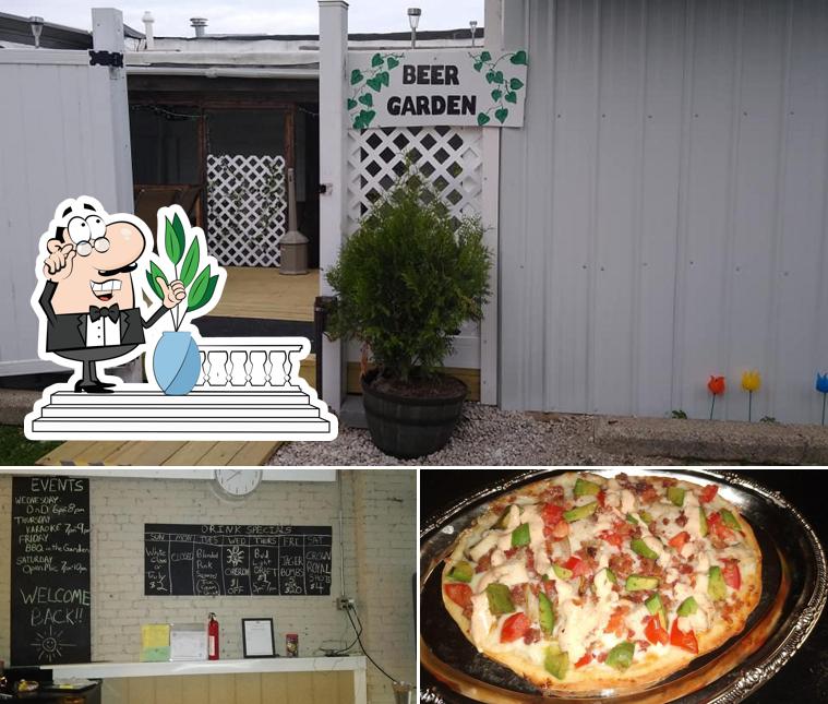 Take a look at the picture depicting exterior and pizza at Aiden's Place