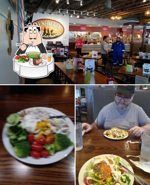 The photo of dining table and interior at Shoney's