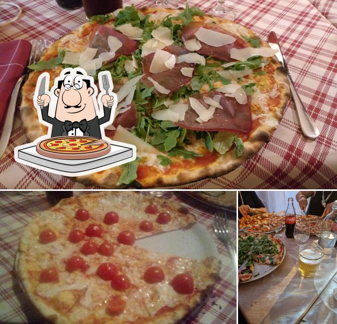 A Ristorante Il Gufo, puoi prenderti una bella pizza
