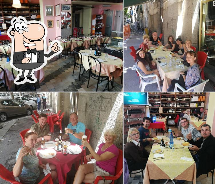 Guarda la immagine che mostra la interni e tavolo da pranzo di Il Bastione Bistrot