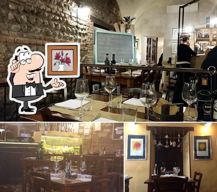 Dai un'occhiata agli interni di Osteria il Ciottolo