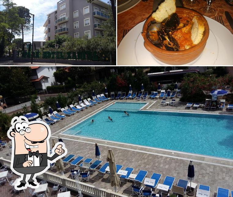 La foto della esterno e frutti di mare di Park Hotel Zadina