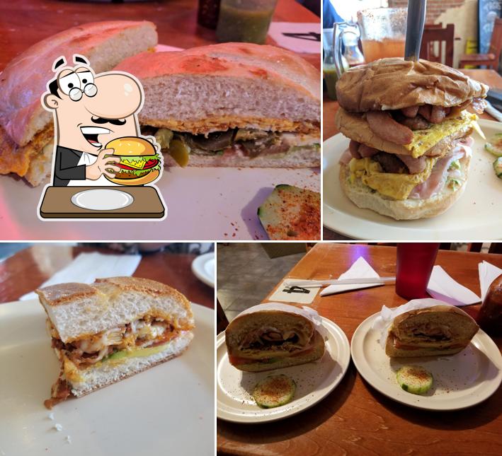 Order a burger at Tortas Guicho Food Truck