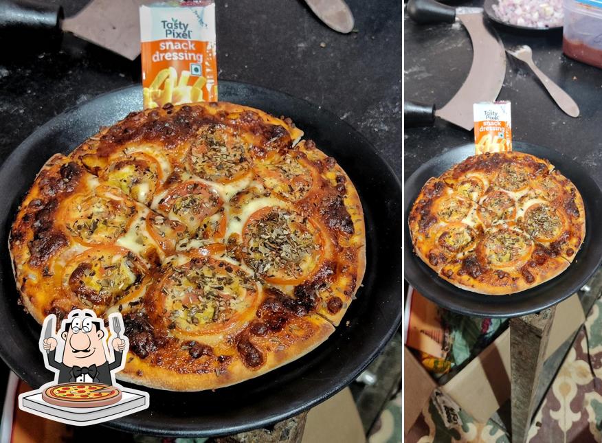 Try out pizza at CAFE SERVE WITH LOVE