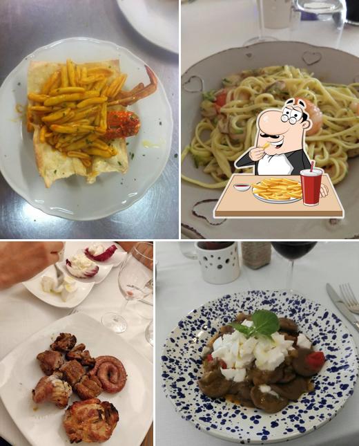 Assaggia le patatine fritte a Osteria La Valle