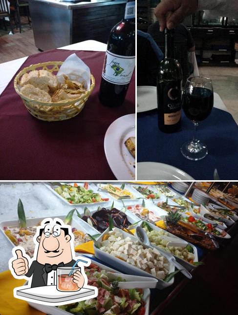 The photo of Alianza Do Brasil Leon Gto’s drink and food
