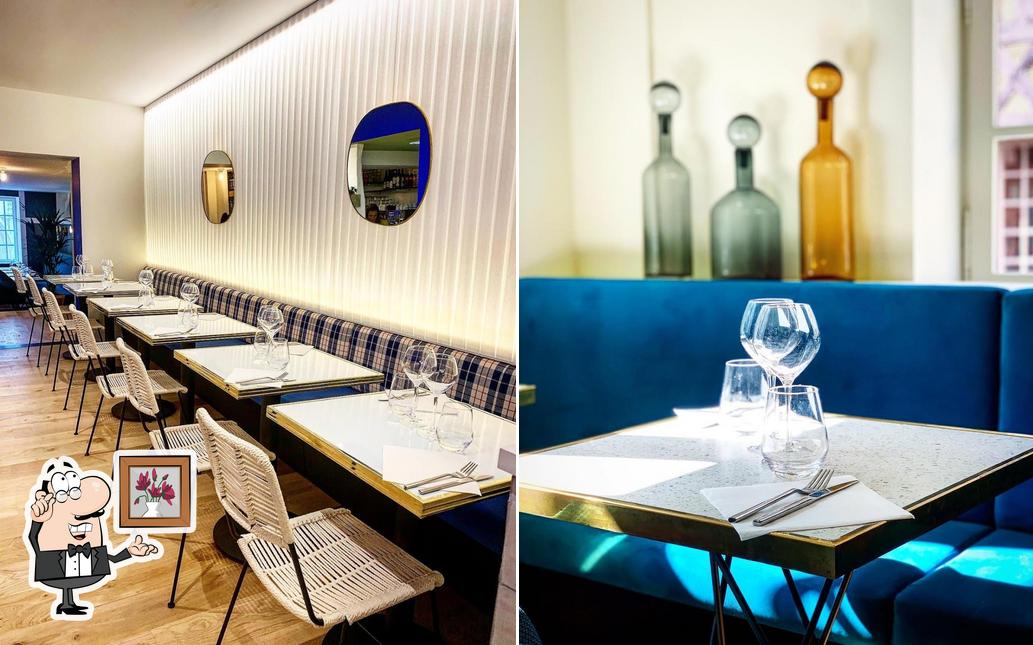 Take a seat at one of the tables at Colette