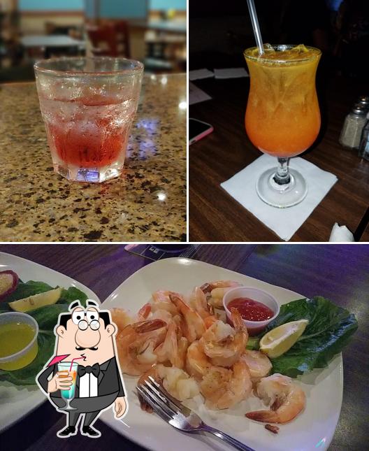 The photo of Jerry's Restaurant & Lounge’s drink and seafood