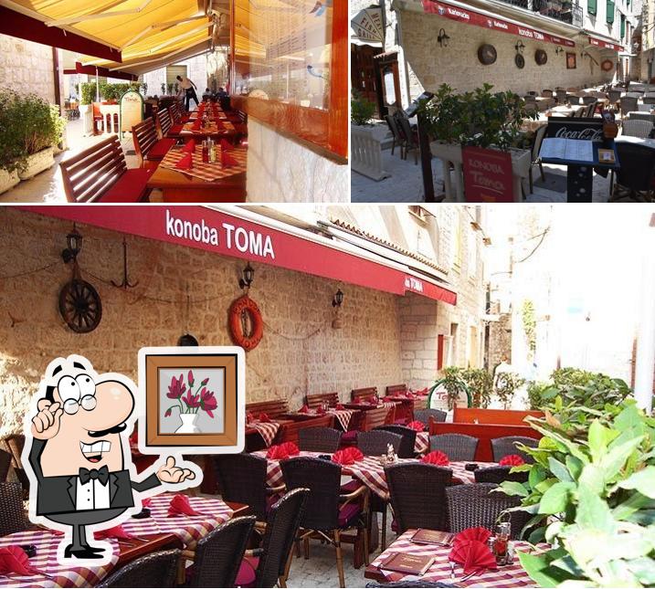 Dai un'occhiata agli interni di Konoba Toma