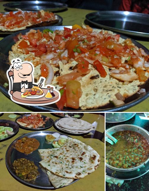 Try out pizza at Sanjay Dhaba