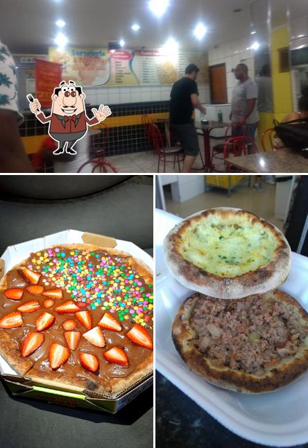 Confira a foto ilustrando comida e interior no Pizzaria New holiday imperador