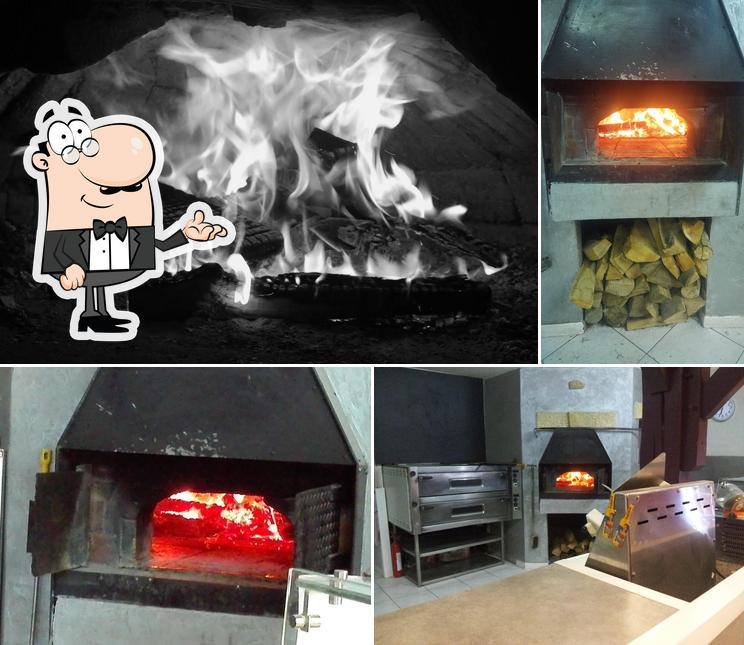 Ô Grain de Pizz' pizzeria pizza au feu de bois (entre le primeur et la boulangerie)