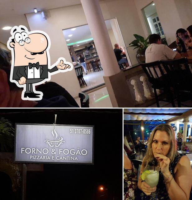 Sente em uma das mesas no Forno e Fogão - Pizzaria e Cantina - Espeto Corrido