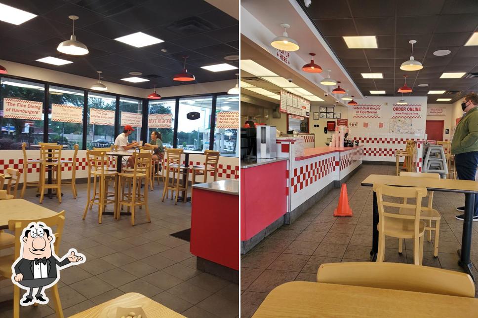 Take a seat at one of the tables at Five Guys