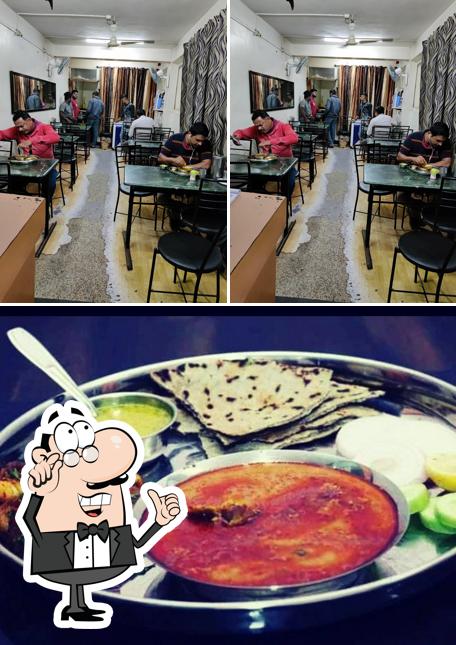 Check out the image displaying interior and food at Nagpuri Mutton Bhakari