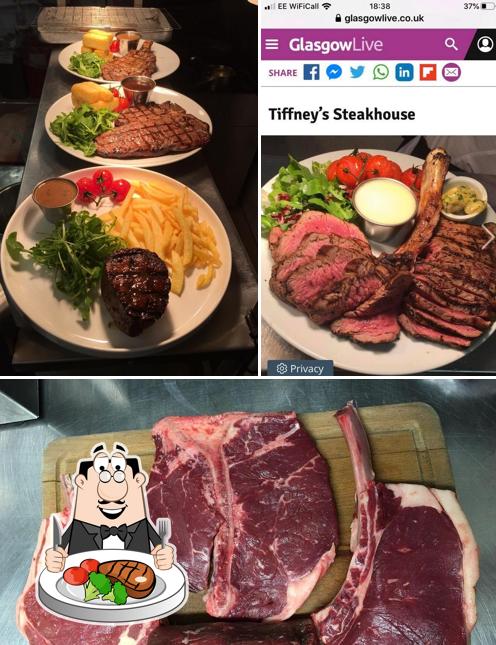 Get meat meals at Tiffney's Steakhouse "The Home Of Dry Aged Beef"
