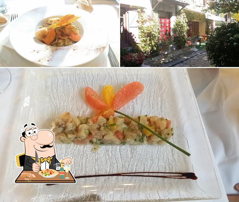 This is the image displaying food and exterior at Hôtel restaurant Beaurivage
