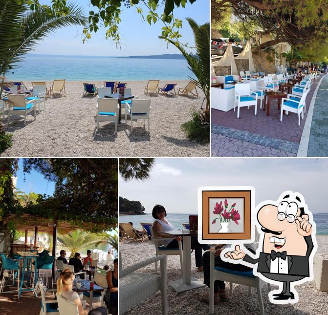 Dai un'occhiata agli interni di Guliver cafe
