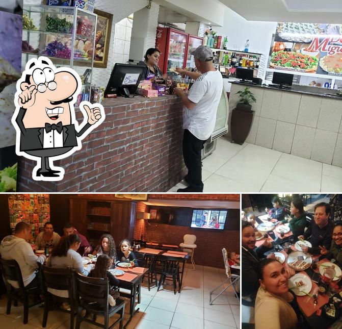 O interior do Pizzaria El Shadai