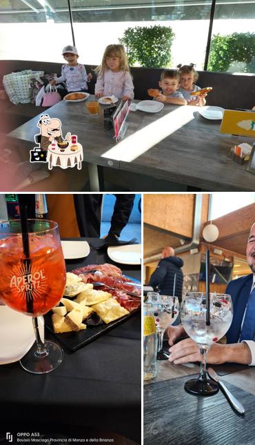 Guarda la foto che presenta la cibo e tavolo da pranzo di Garden Bistrot