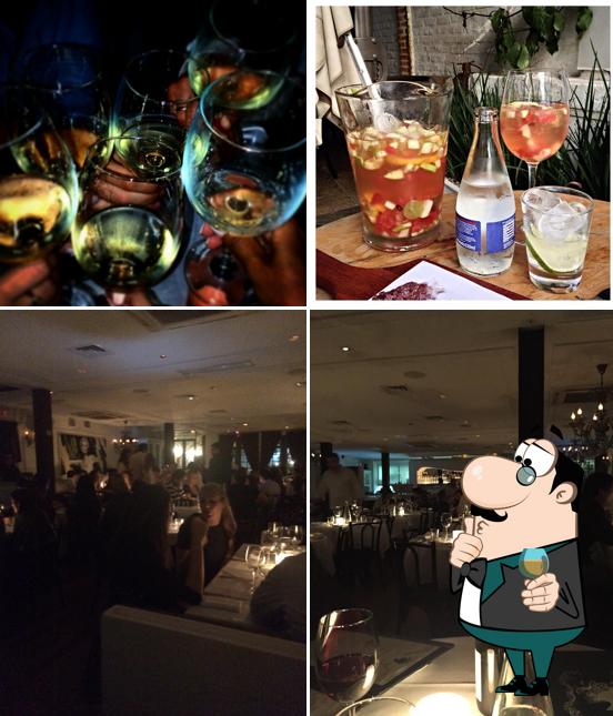 Посмотрите на это изображение, где видны барная стойка и напитки в Bagatelle Bar e Lanches