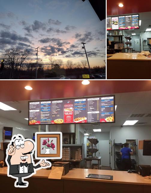 Mira las fotos que muestran interior y exterior en Domino's Pizza